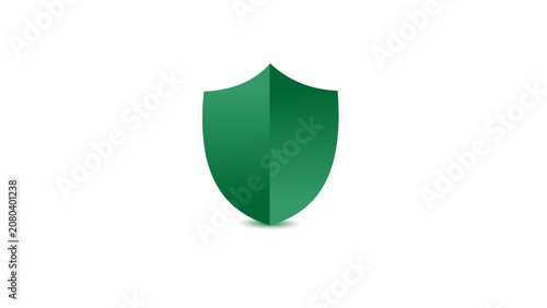 Green three-dimensional shield shape with glossy finish and subtle shadow on plain white background.