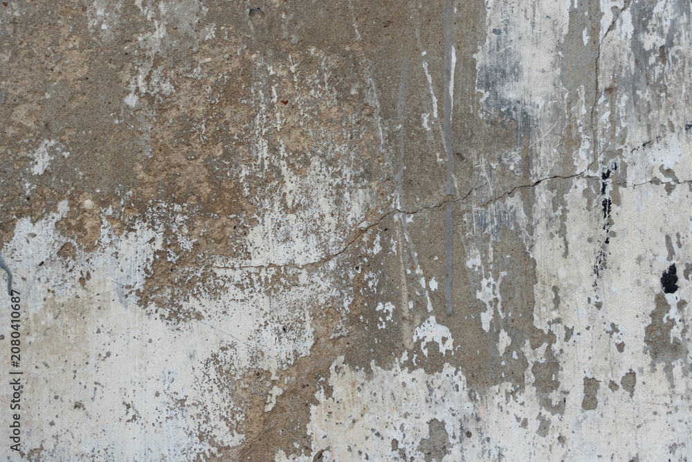 Fototapeta premium Distressed concrete wall texture with peeling plaster and weathered surface background