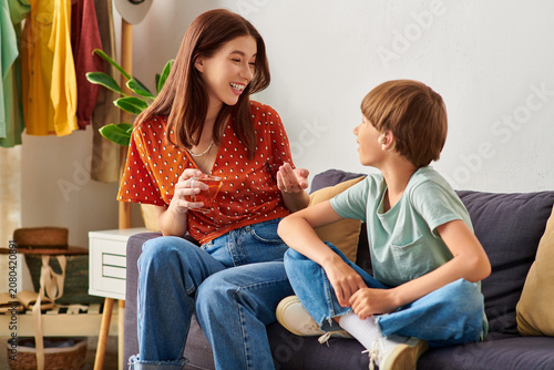 Εκτύπωση καμβά A loving moment shared between a mother and her hearing impaired son