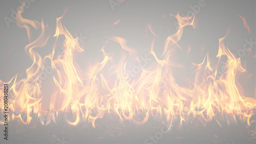 Fotografie Flames of fire dancing against a soft gray background, showcasing vibrant orange