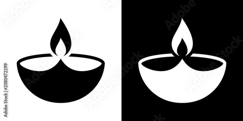 Black and white diya lamp icons on contrasting backgrounds