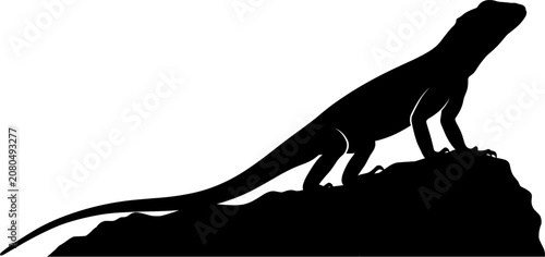 Bild auf Leinwand vector can editable Majestic lizard silhouette perched atop a rugged stone outcr