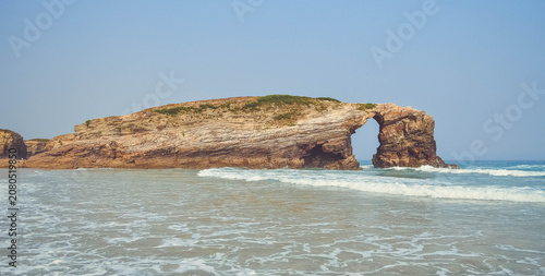 Las Catedrales beach is the tourist name for Aguas Santas beach, located in the Galician municipality of Ribadeo, on the coast of the province of Lugo, Spain, on the Cantabrian Sea.