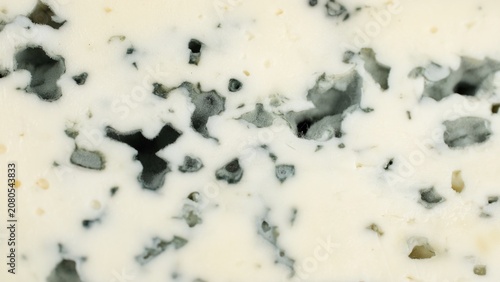 Blue cheese. Heap of sliced blue cheeses with a noble mold