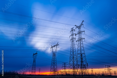 The pylons are in the evening, Substation in the evening, High voltage substation and beautiful sunset glow
