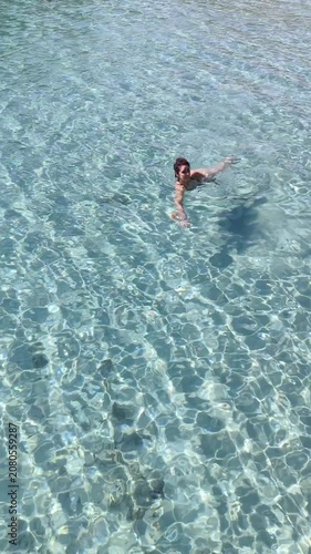 girl snorkeling in the sea of salento