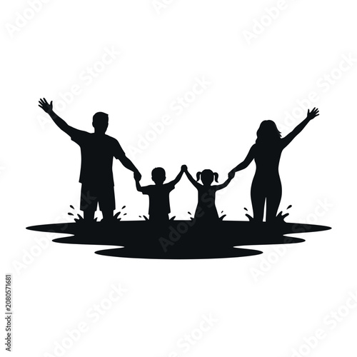 Silhouette of happy family holding hands and celebrating together outdoors