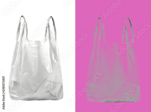 Single empty plastic grocery bag with handles, captured on white and dark backgrounds to emphasize the translucent and crinkled isolated on a transparent background