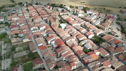 An Aerial view of Granon red-roofed homes and church tower along the Camino de Santiago in Spain