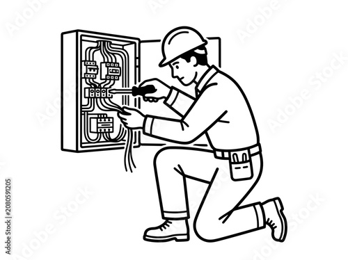 Worker in hard hat repairing electrical panel with tools