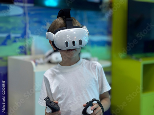 School age child exploring virtual reality technology for learning and education
