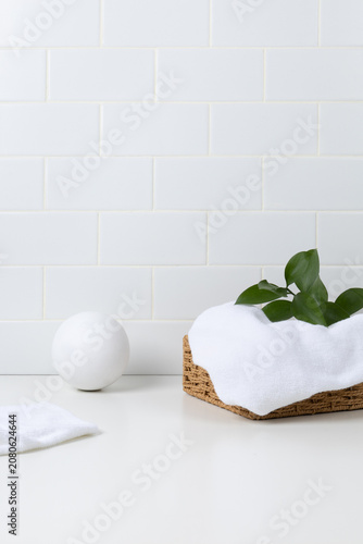 Minimalist organic skincare mockup scene in bright bathroom interior. Clean aesthetic template with copy space for wellness, beauty products, or body care brands.