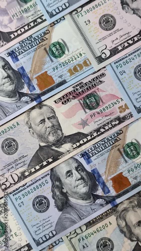 Paper US dollar bills of various denominations and cent coins as a business tool for exchange and trade. Cash US dollars as a background for your design