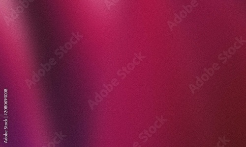 Abstract dark magenta background featuring a subtle grainy texture with soft glowing light gradients that create a smooth artistic surface perfect for modern graphic design projects or creative digita