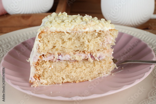 Slice of strawberry cake served on a plate