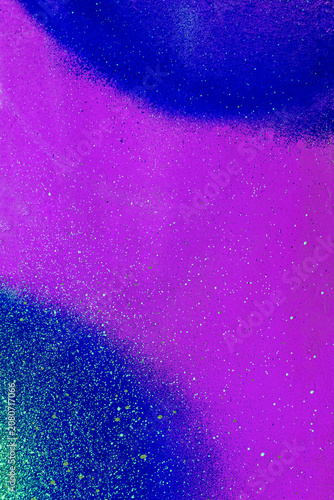 colorful background pattern of urban streen wall graffiti for concept and design. Aerosol bright vivid painting on a city walls