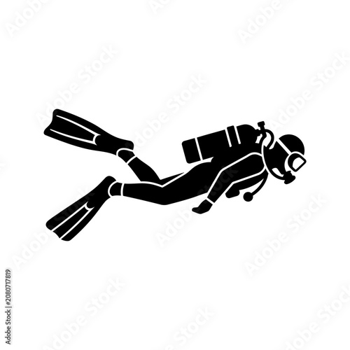 Silhouette of a scuba diver swimming underwater.