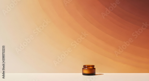 Empty amber glass jar with sunlight shadow on podium