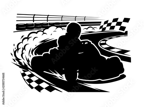 Silhouette of a gokart racer speeding around a track.