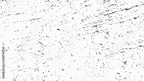 Obraz na plátně Distress overlay texture with scattered black specks and scratches on a white ba