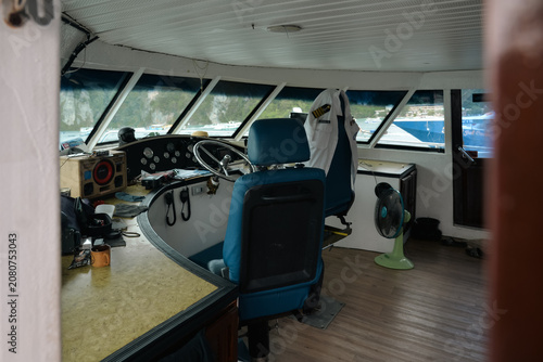 Phi Phi Islands, Thailand – May 18, 2026: Captain’s bridge with navigation controls inside a passenger ferry operating between Phuket and Phi Phi Don