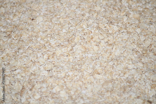 Oat flakes heap in isolated on white background.Rolled oat flakes Top view. Flat lay