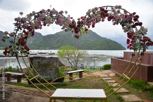 Phi Phi Islands, Thailand – May 18, 2026: Decorative floral photo spot in the garden of Phi Phi Natural Resort on Ko Phi Phi Don