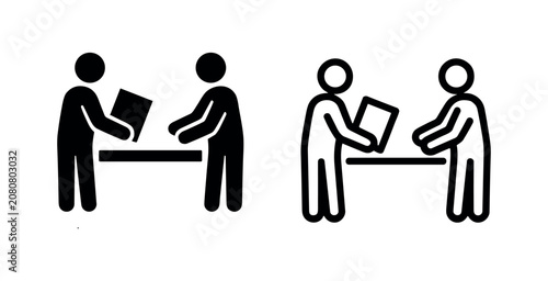 Фотография Document exchange icon set: two people transacting over a desk.