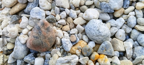 Photography Detailed background of river pebbles in clear water