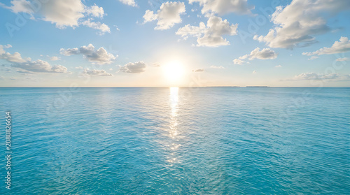 Serene natural cloud formation over calm ocean waters at sunset