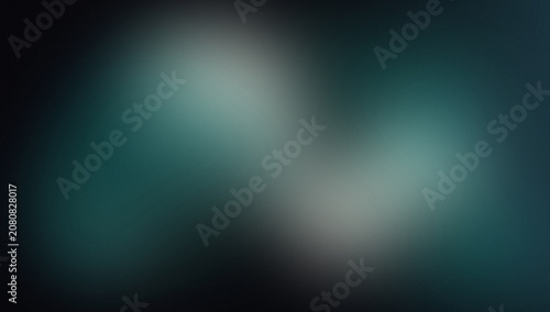 Obraz na płótnie Abstract heart shaped light blue and white spot on dark background