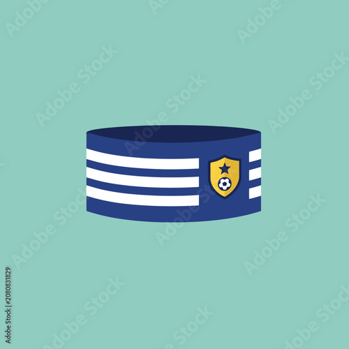 A blue captain armband with white stripes and a gold shield