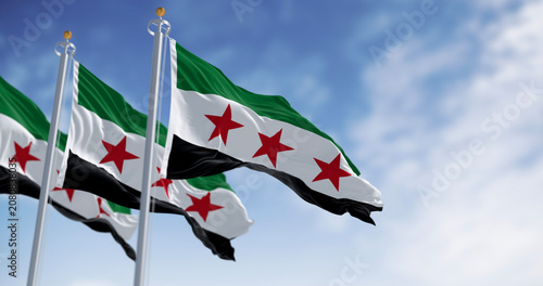 Syria national flags waving on a clear day