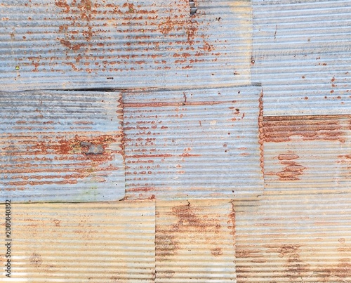 Old rusty corrugated metal texture background, weathered iron surface with grunge aesthetic for industrial design