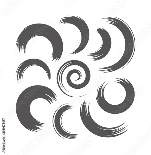 Collection of dark grey brush stroke shapes white
