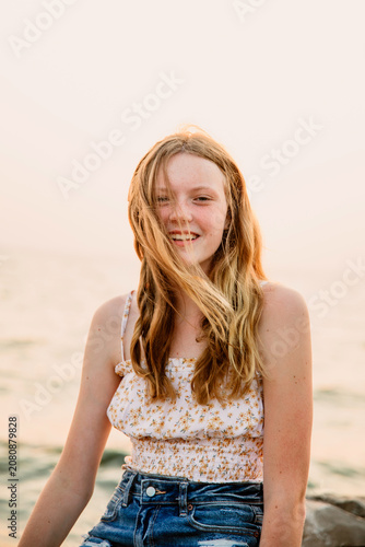 closeup of young woman on shore