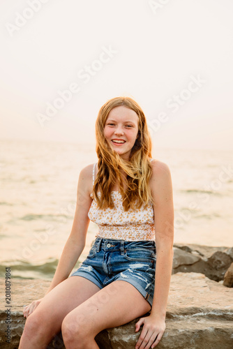 young woman on the beach shore