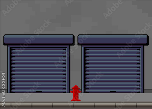 Two closed, dark blue rolling shutter garage doors side by side against a grey wall on a sidewalk, with a small red fire hydrant standing on the ground between them.
