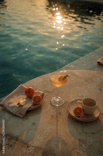 Enjoying Drinks by the Pool During Sunset in a Tropical Location