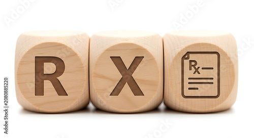 Three wooden blocks with medical prescription symbols on white background