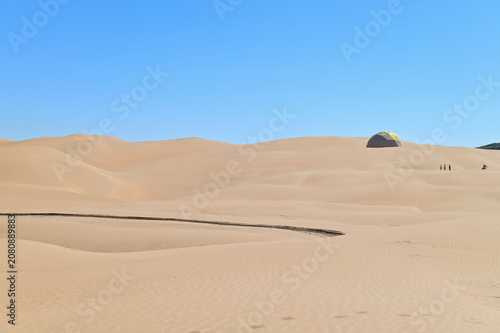 Minimalist Desert Scenery with Golden Dunes in Xiangshawan Desert, Inner Mongolia