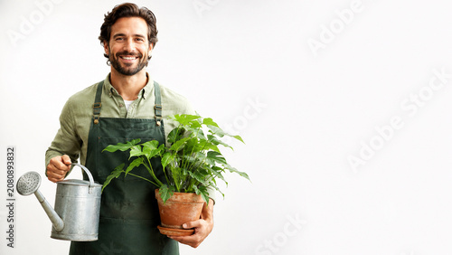 Green Thumb Gardener: A smiling man in an apron holds a watering can and a potted plant, ready to nurture his greenery. His cheerful demeanor and healthy plant radiate a passion for gardening.