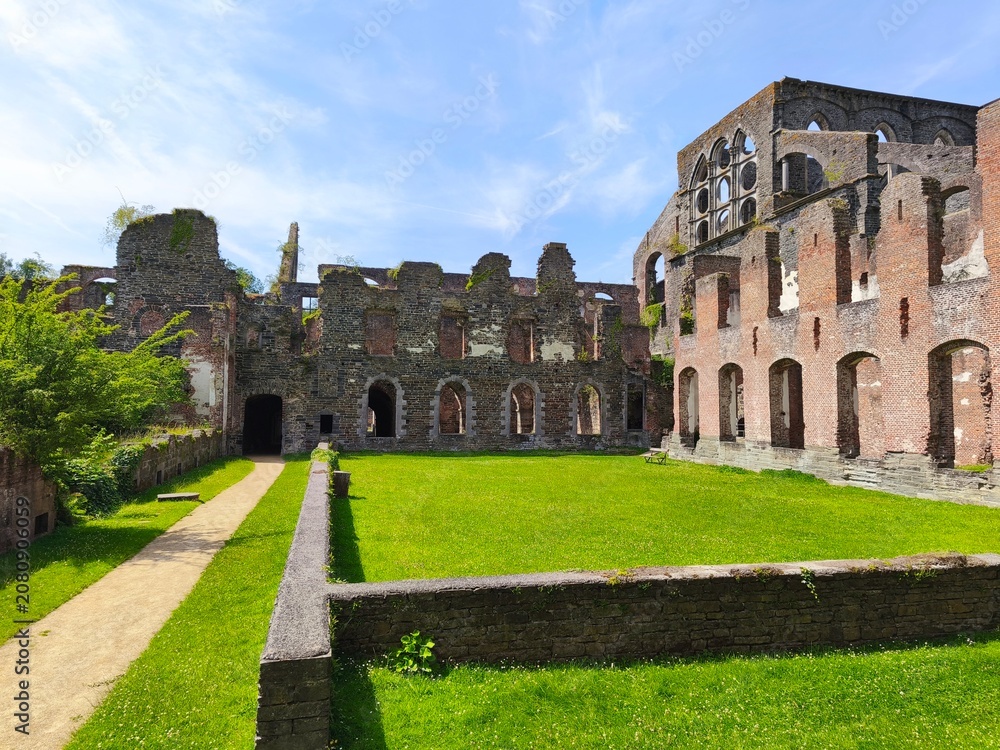 Fototapeta premium Stunning view of medieval Belgian abbey architecture under natural light.
