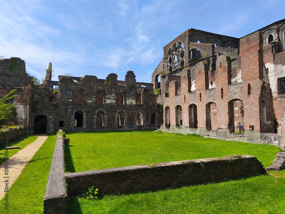 Fototapeta premium Stunning view of medieval Belgian abbey architecture under natural light.