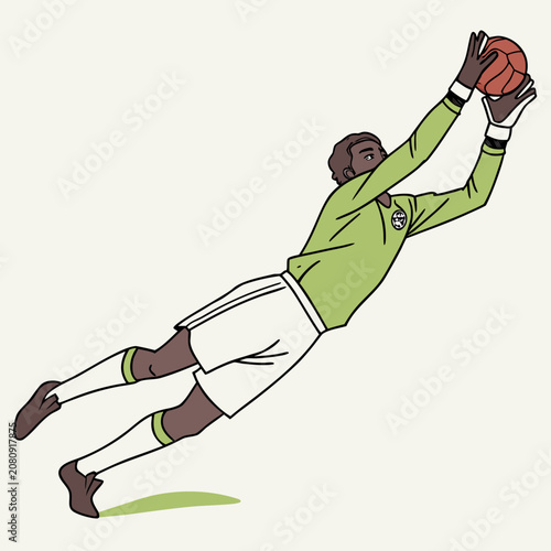 Professional soccer goalkeeper jumping to catch a football with goalkeeper