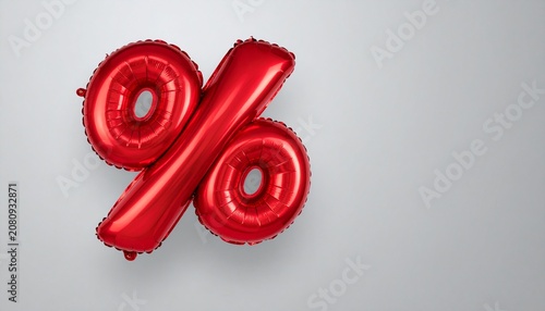 Metallic Red Mylar Foil Balloon Shaped Like a Percentage Symbol Over an Off-White Background