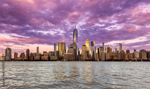 Wide-angle panoramic view of the iconic New York City skyline in the early evening