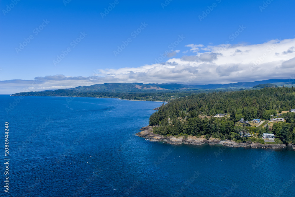 Naklejka premium Aerial Ocean Coastline Over Otter Point and Sooke Forests on Vancouver Island, British Columbia