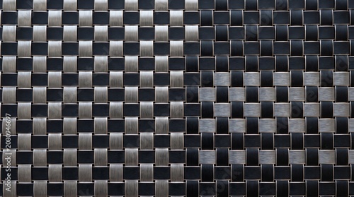 Abstract woven metallic and black textured background pattern