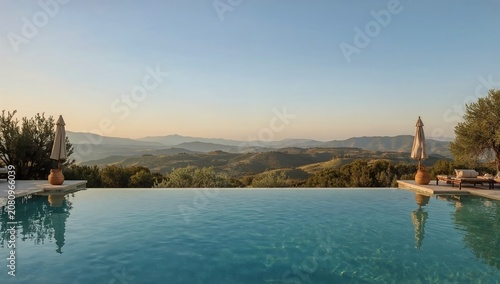 Scenic View of a Pool Overlooking Rolling Hills During Sunrise in a Quiet Loc...